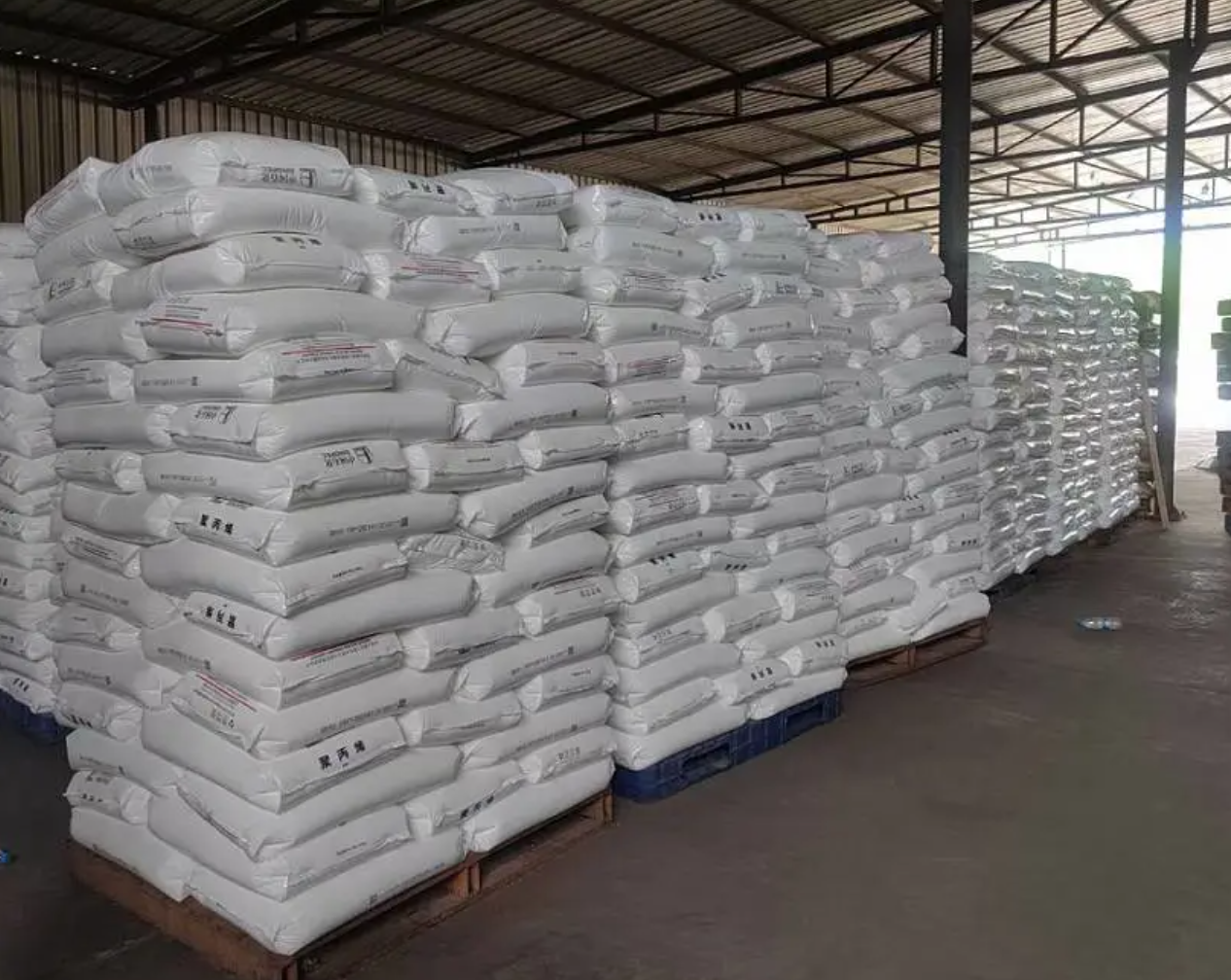 warehouse-stacked-white-bags-shenhua-xinjiang-s1003-polypropylene-raw-material